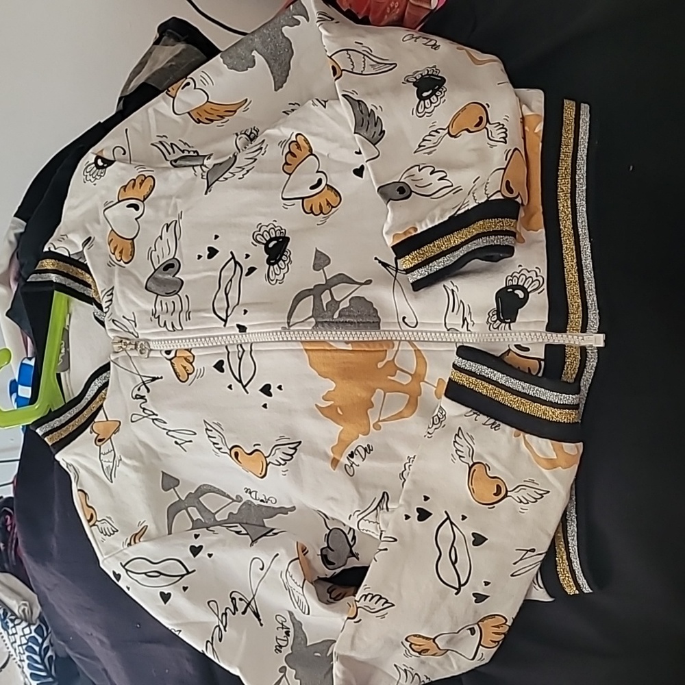 A beautiful angel, heart print jacket. Children jacket size 10-12